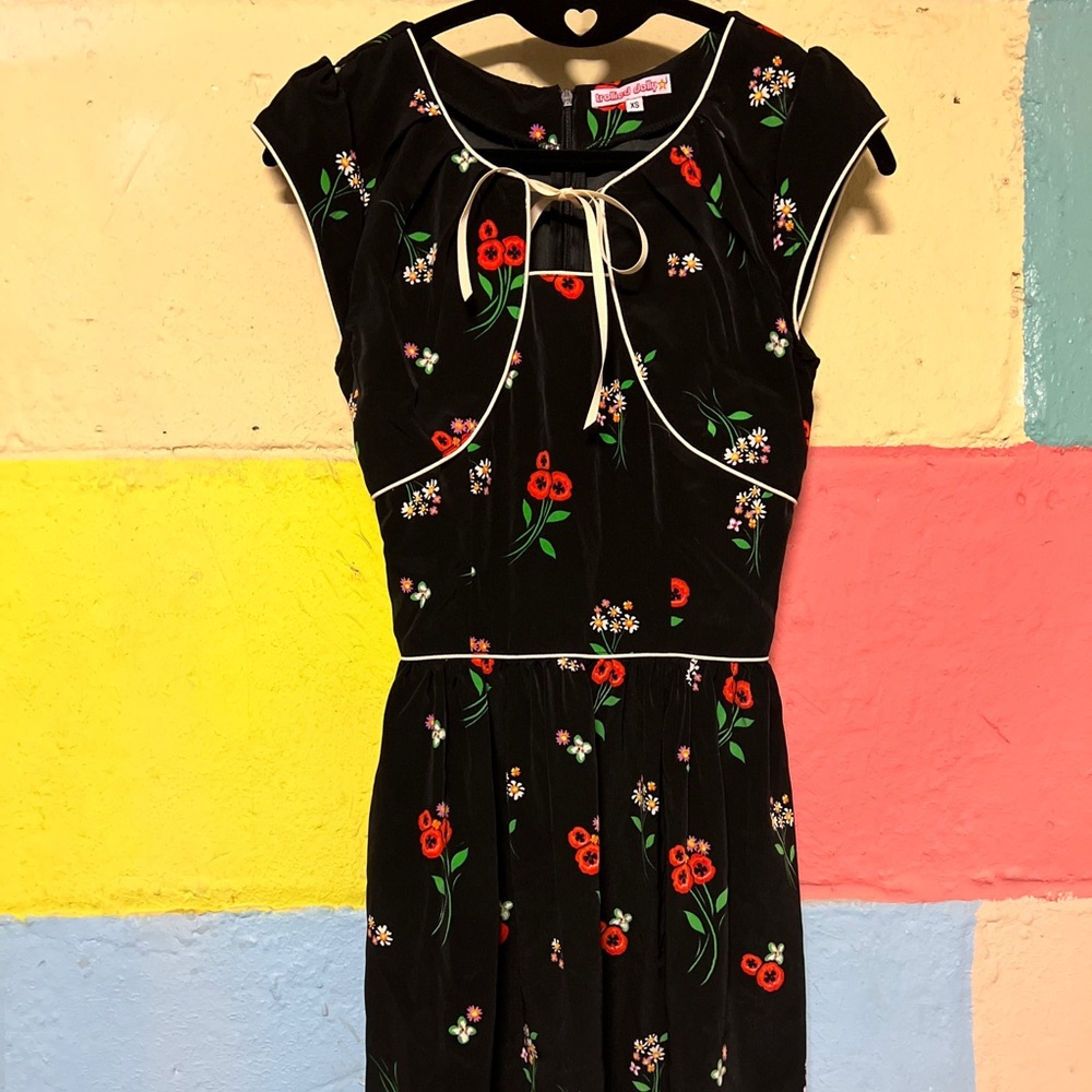 Trollied Dolly Xs NWOT vintage inspired dress. Adorable puff cap sleeves.